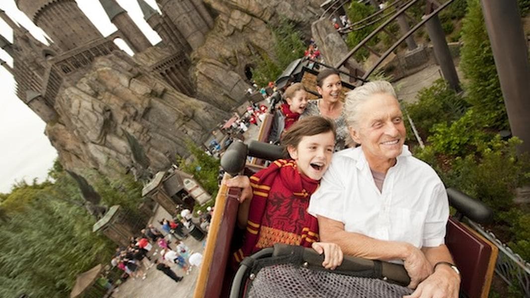 Stars in the Parks: Zeta-Jones, Douglas and kids ride a Hippogriff