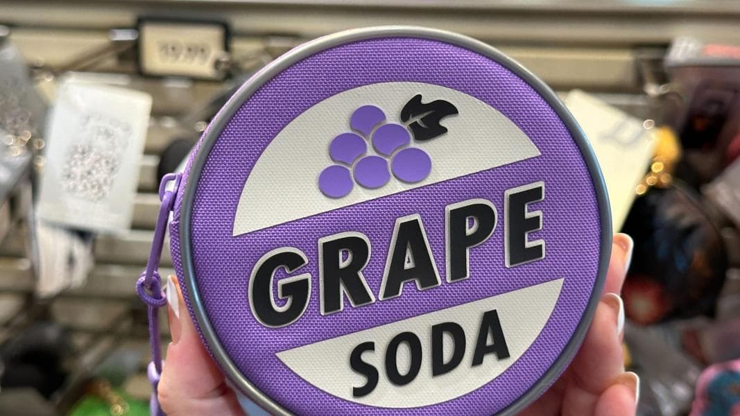 New Coin Bags at Walt Disney World Have Grape Soda, Stage Show References