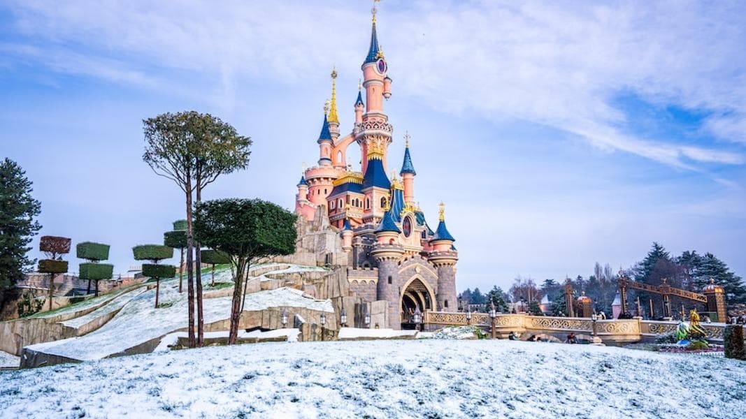 PHOTOS: See Disneyland Paris Dusted In the First Snowfall of the Season