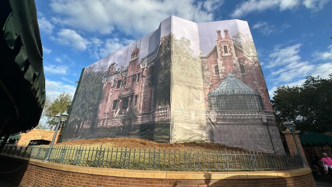 Construction Walls Expanded, More Themed Scrim at The Haunted Mansion in Magic Kingdom