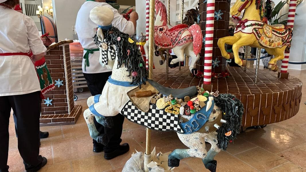 Cast Members Putting Final Touches on Disney’s Beach Club Resort 25th Anniversary Gingerbread Carousel