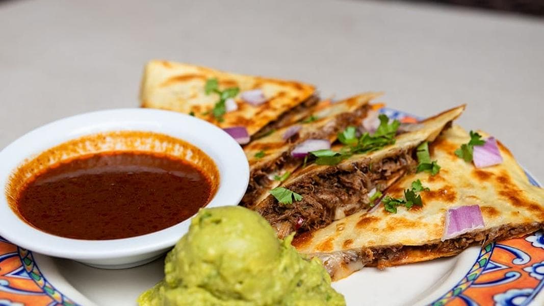 Confisco Grille Adds Quesabirria, Santa Fe Salad, and More to Menu at Universal Islands of Adventure