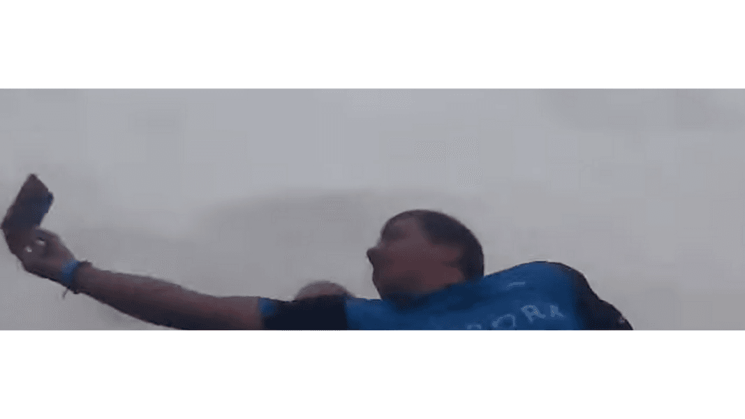 VIDEO: Man catches a stranger’s flying cell phone while on a roller coaster