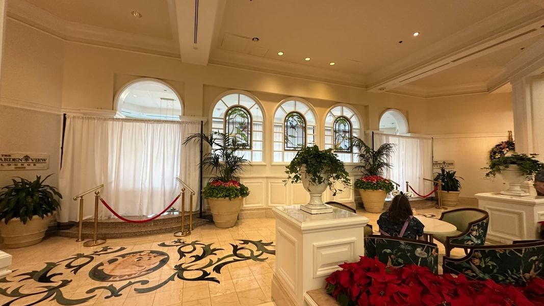 Refurbished Garden View Tea Room Interior Visible Through Windows at Disney’s Grand Floridian Resort