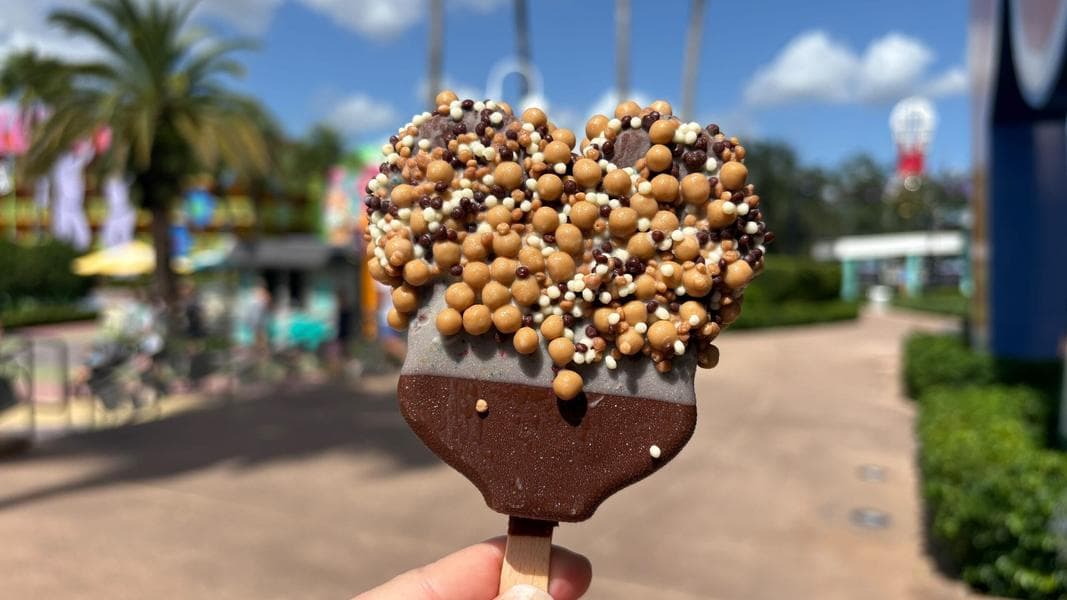 Hand-Dipped Mickey Ice Cream Bar with Salted Caramel Pearls is a Surprise at Disney World