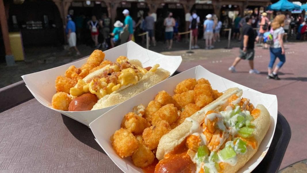 REVIEW: NEW Loaded Buffalo Chicken Hot Dog & Loaded Bacon Macaroni and Cheese Hot Dog at The Friar’s Nook in the Magic Kingdom