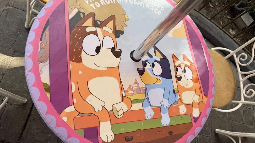 Troubadour Tavern Tables Wrapped in Bluey-Themed Covers