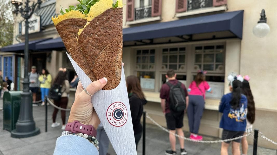 We Tried EPCOT’s New Giant Crepe Filled with Ham & Cheese