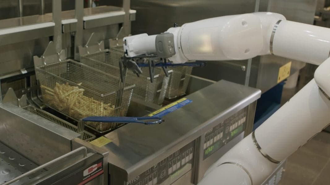 Fry Robot Named Horton Preparing Food at Universal Orlando Resort