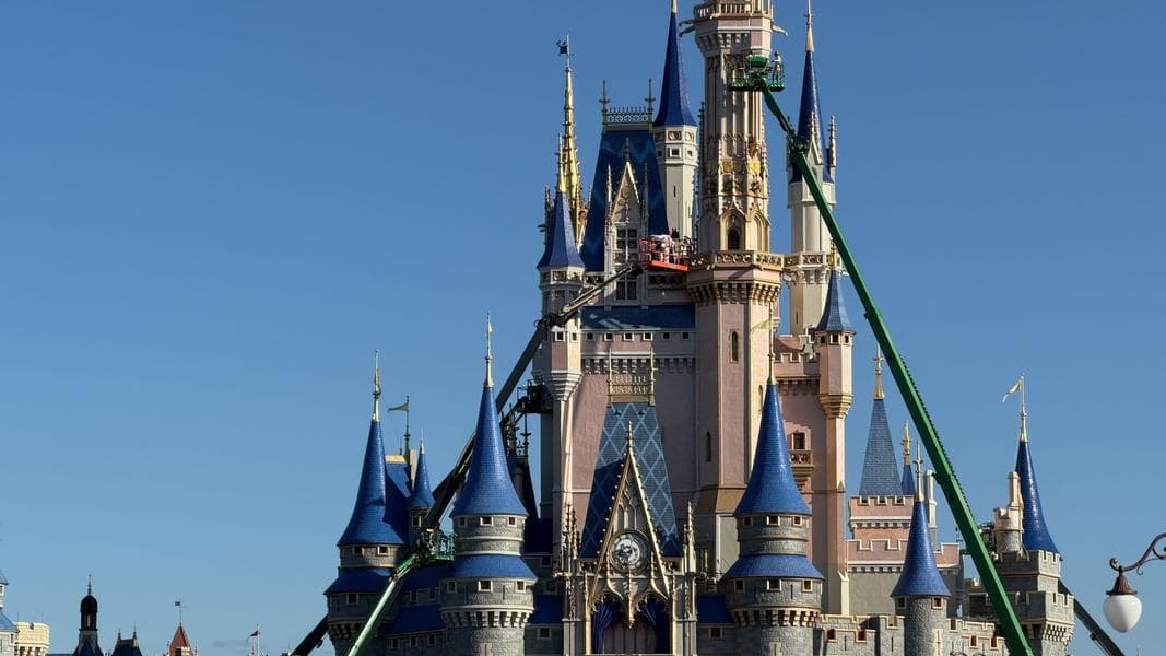 Crews Begin Painting Tallest Tower of Cinderella Castle at Magic Kingdom