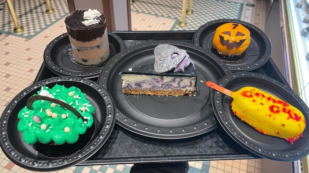 REVIEW: Chucky’s Killer Cake Pop, Spirit Board Blackberry Cheesecake, and More Spooky Snacks from the San Francisco Pastry Company for Halloween Horror Nights 31