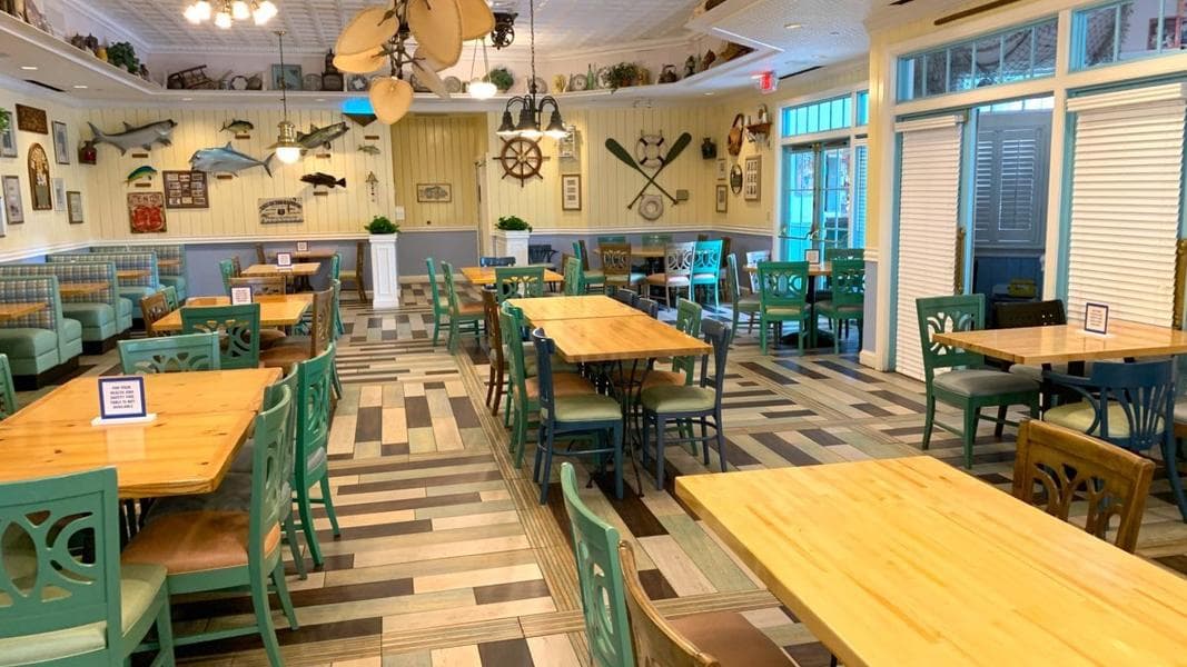 Olivia’s Cafe Photos Removed from Walls, Preserved in New Albums at Conch Flats Community Hall at Old Key West Resort